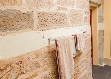 Bathroom and exterior stone cladding at Parkside S.A.