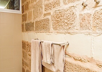 Bathroom and exterior stone cladding at Parkside S.A.